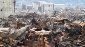 In Kesennuma, garbage covers much of the city, particularly in the harbor. Some baseball fields and parks nearby have been converted into areas where cranes can sort through the debris.