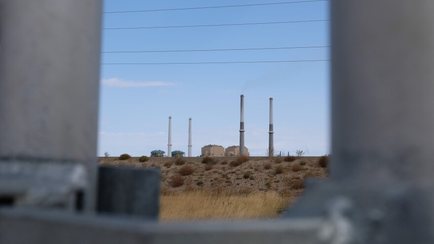 Colstrip coal-fired power plant seen through a gate