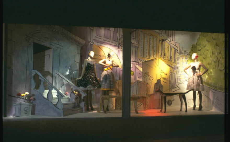 This window was created in 1987 and features two women moving into an apartment together. The walls and set pieces were painted in the style of Ludwig Bemelmans, the creator of the Madeline books. "It turns out that his style is very easy to replicate if you don't get into too much detail," Leathers said. The two dog sculptures growling at each other are by French sculptor Gerard Rigot.