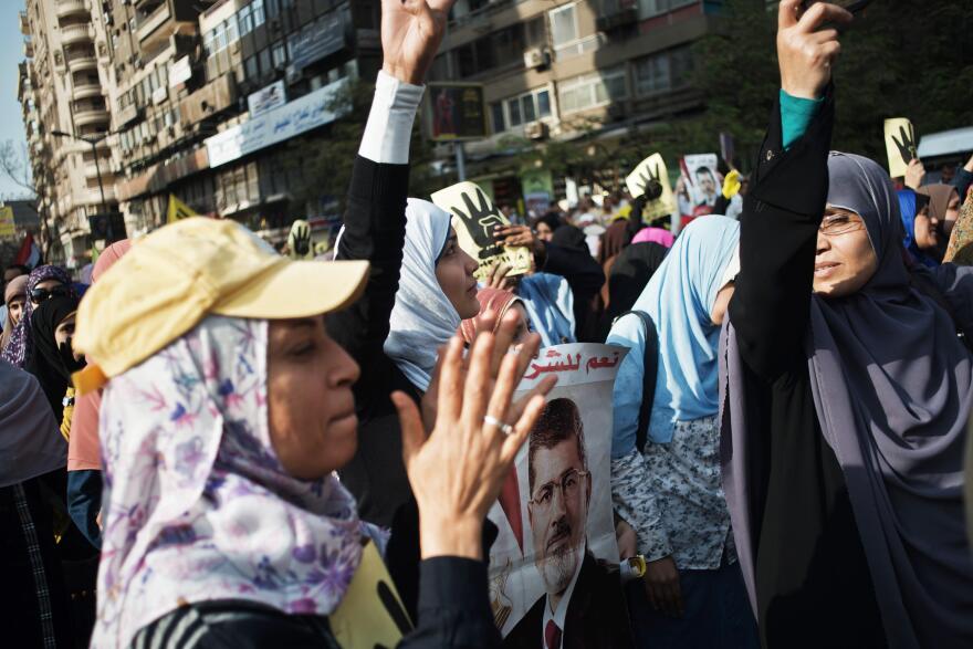 Women supporters of the Muslim Brotherhood and ousted president Mohamed Morsi take part in a march through the streets of Cairo on November 8, 2013.