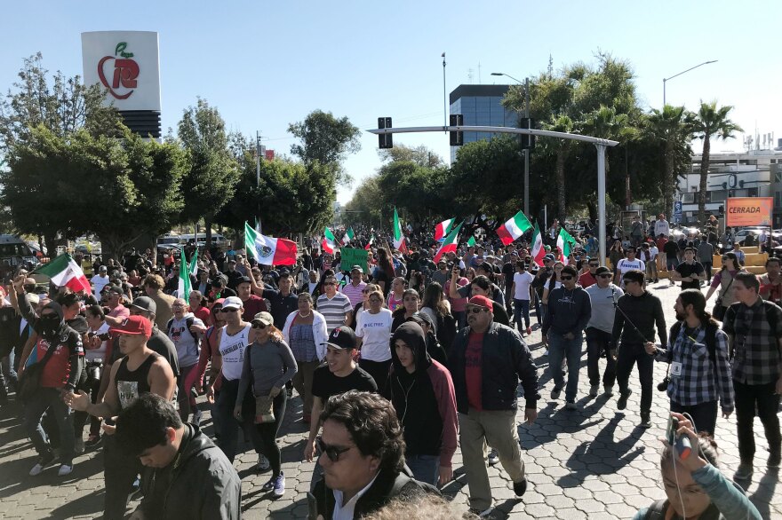 A few hundred people gathered in Tijuana's high-end Rio area in October to protest against groups migrating from Central American countries.