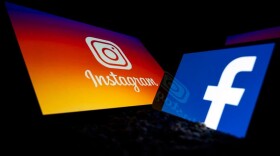 Logos of Facebook and Instagram on the screens of a tablet and a mobile phone. (Lionel Bonaventure/AFP/Getty Images)