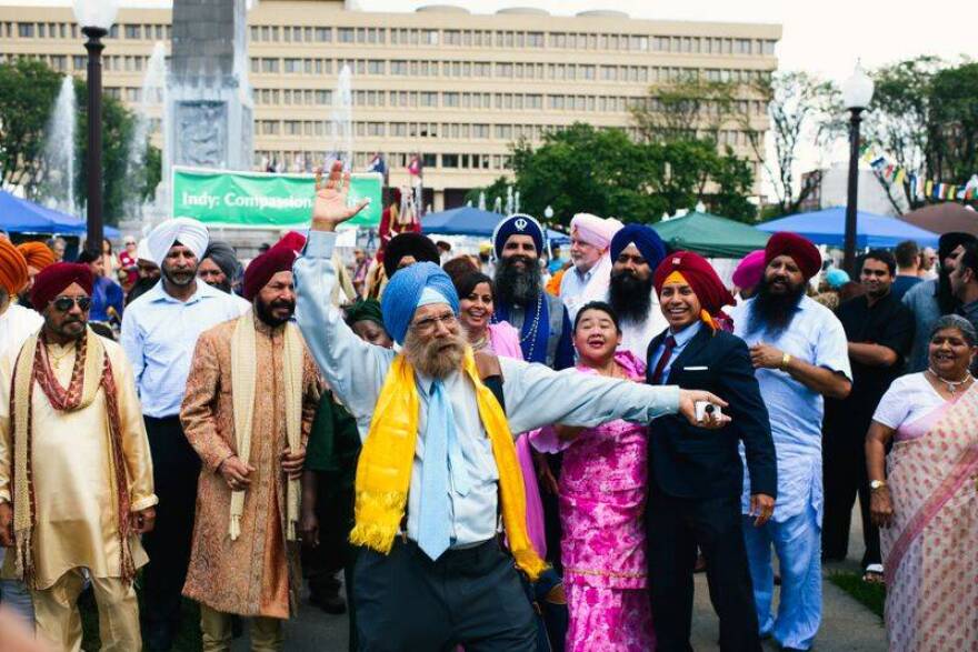 Sikh community members participate in parade during the Festival of Faiths in Indianapolis