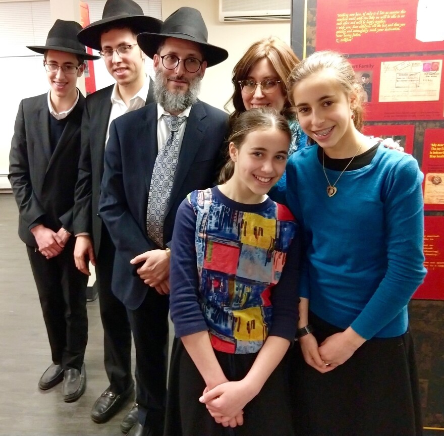 A Haredi family photographed inside Amud Aish Memorial Museum in Brooklyn, which is designed for Orthodox Jews.