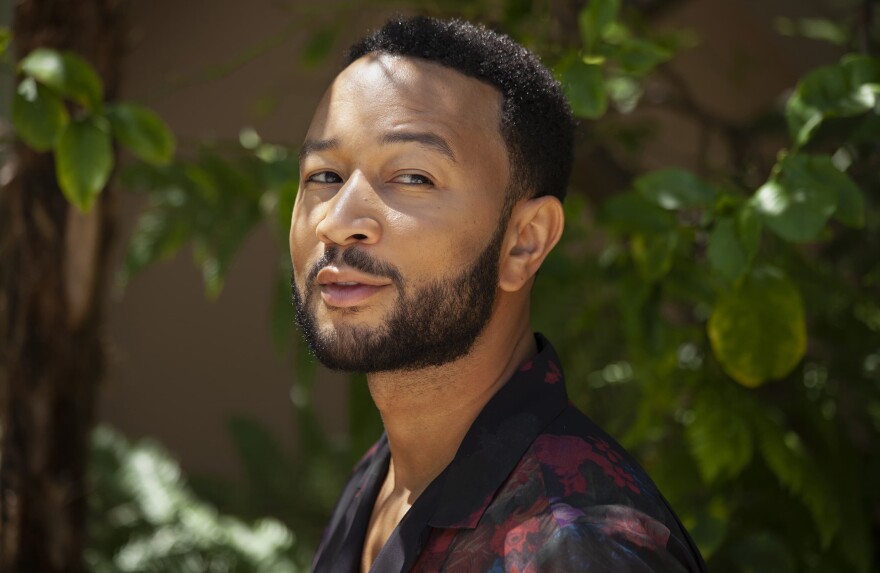 Singer-songwriter John Legend appears during a photo session at The Bel Air Hotel in Beverly Hills, Calif., to promote his latest album "Bigger Love." (Rebecca Cabage/Invision/AP)