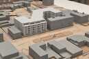 A tabletop model of Hyde Park Square showing existing buildings and the proposed new development.