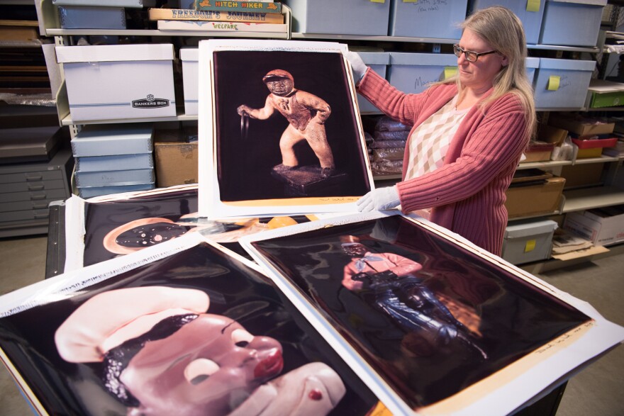 woman holding a dave levinthal blackface polaroid