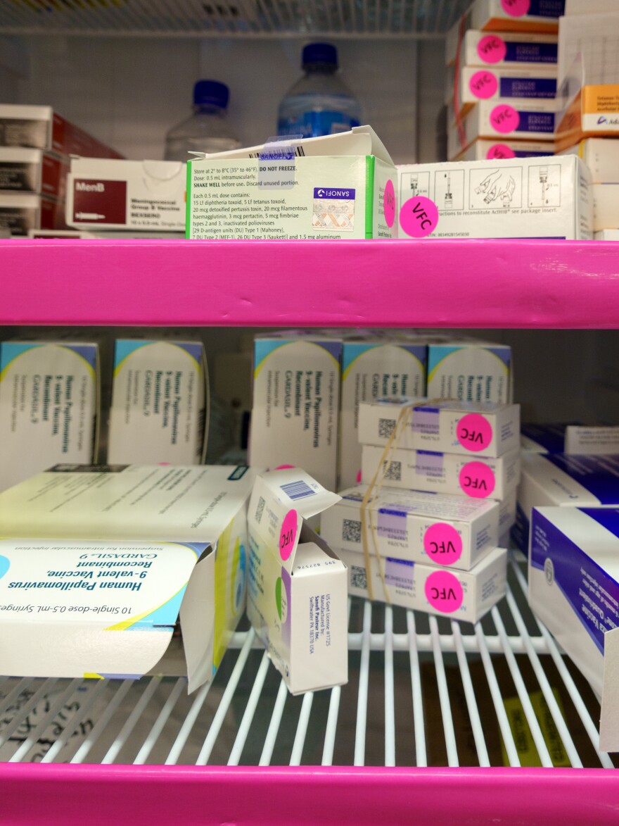 A refrigerator at Mid-Valley Children's Clinic in Albany, Oregon with supplies of government-funded vaccines for children on Medicaid. The pink "VFC" stickers help clinics follow stringent federal rules and ensure only eligible children get the "Vaccines for Children" shots.