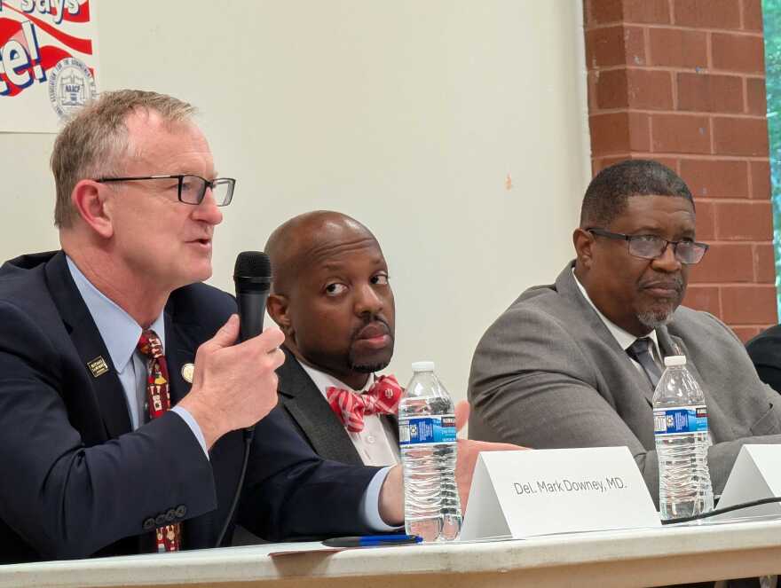 Del. Mark Downey (left), next to Malik Gladden, Old Dominion University cybersecurity professor, and Robert Lester, Virginia Interfaith Center for Public Policy civic engagement coordinator, at the YJCW NAACP branch town hall on Monday, April 13, 2026.