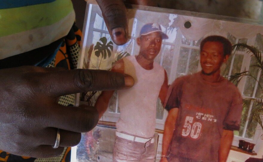 Nialina Ba points to her late husband, Bourang Ba.