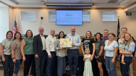 Wasatch County School District Board of Education members celebrate the opening of the district's first childcare center with center staff, students and parents on Aug. 27, 2026.