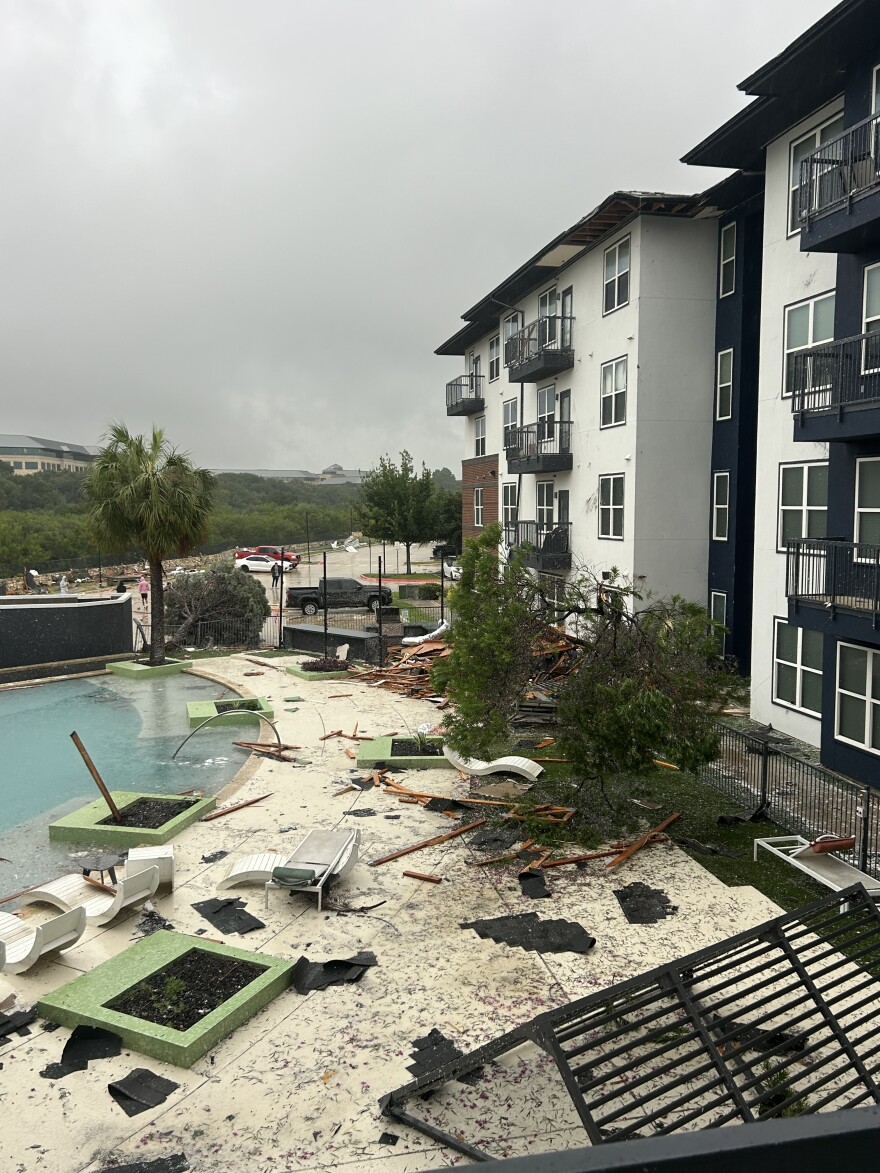 Tornado left debris strewn around a pool at San Antonio Oasis on UTSA Blvd. on July 15, 2026