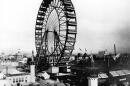 The grounds of the 1893 World's Columbian Exposition in Chicago, Ill., are shown in May, 1893.  The first ferris wheel, which carries 1,400 persons 250 feet into the air, is one of the biggest attractions.  The exposition opened on May 1. (AP Photo)