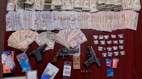 July 29, 2026 - $74,000 in U.S currency, four firearms, four vehicles, and a trafficking quantity of fentanyl were seized in an investigation that led to the arrest of 56-year-old Darren Turner of Athens.