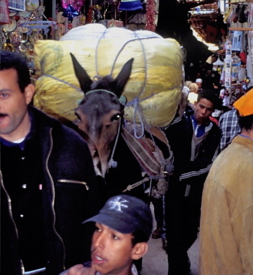 Tight quarters in ancient Fez, Morocco souk.