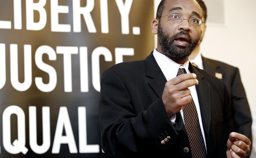 Yassir Fazaga, a religious leader of the Orange County Islamic Foundation takes questions from the media, as he announces a lawsuit against the FBI at the ACLU Foundation of Southern California headquarters in Los Angeles on Feb. 23.
