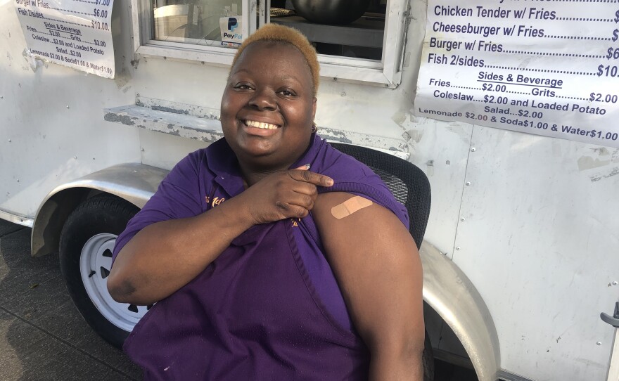 Lillie McCoy runs a food truck, Soul Heaven Café, with her husband. She had struggled to find time to get vaccinated and the food truck festival offered the perfect opportunity.