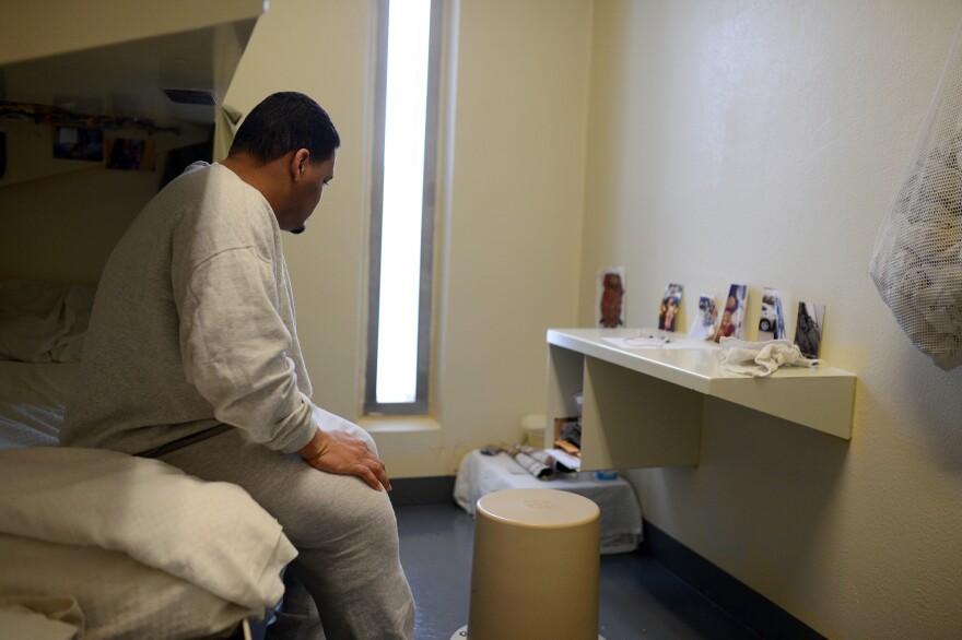 Eric Darden sits in his cell.