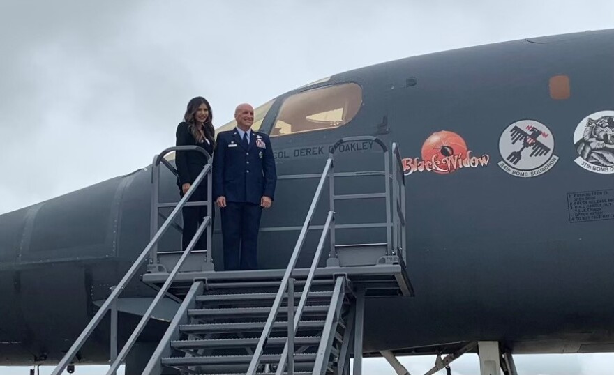 Gov. Kristi Noem stands next to Col. Derek Oakley, the new commander of the 28th Bomb Wing, on June 23, 2023