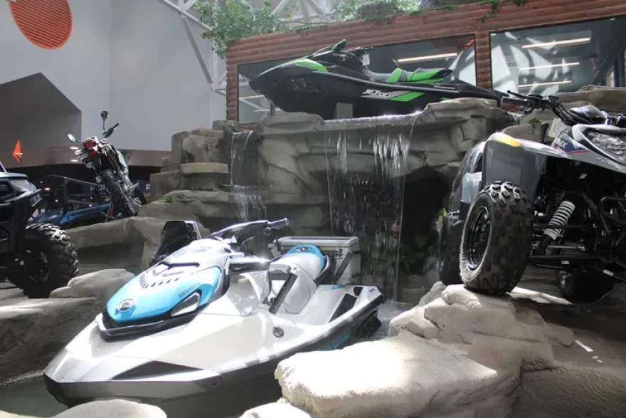 Powersport vehicles flank an indoor waterfall at the newly redeveloped Marion mall.