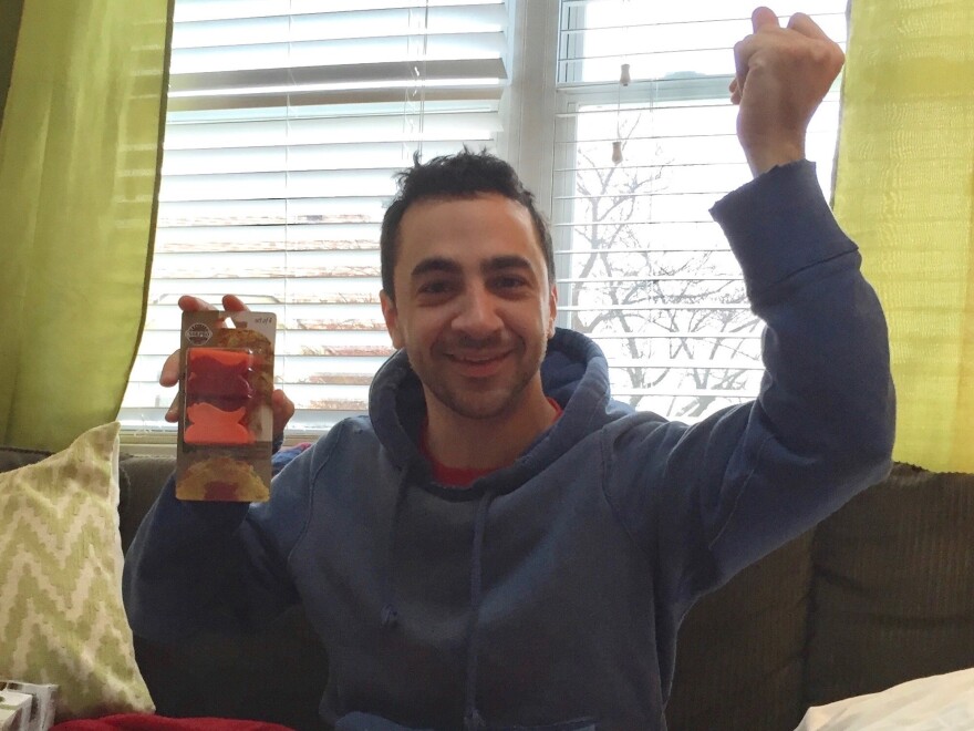 Adam Shokery shows off a set of taco holders his late mom gifted to him and his sister, Andrea Hayes.