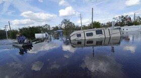 Flooded campers are seen at the Peace River Campground in the aftermath of Hurricane Ian in Arcadia, Fla., Monday, Oct. 3, 2022. (AP Photo/Gerald Herbert)