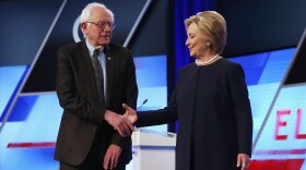 Bernie Sanders and Hillary Clinton before the Univision News and <em>Washington Post</em> debate on the Miami Dade College Kendall Campus on Wednesday in Miami.