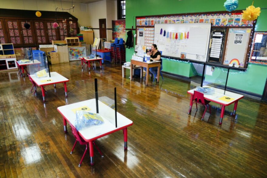 Tara Matise teaches her prekindergarten students virtually in her classroom prepared ahead of planned in-person learning at Nebinger Elementary School in Philadelphia, Friday, March 19, 2021.