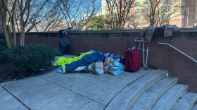 A homeless person sleeping at the county library in downtown Wilmington