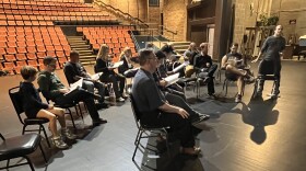 The cast of the Center Stage Jackson production of The Full Monty at a recent rehearsal. Talon Baldwin (far right) is producing the show, and also has the lead role of Jerry Lakowski.