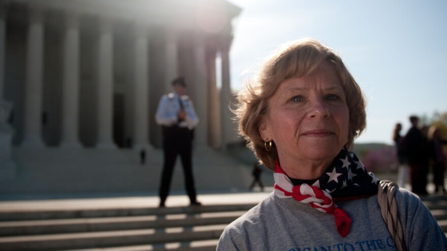 Carolyn Weller came from Idaho to join the scene outside the Supreme Court.