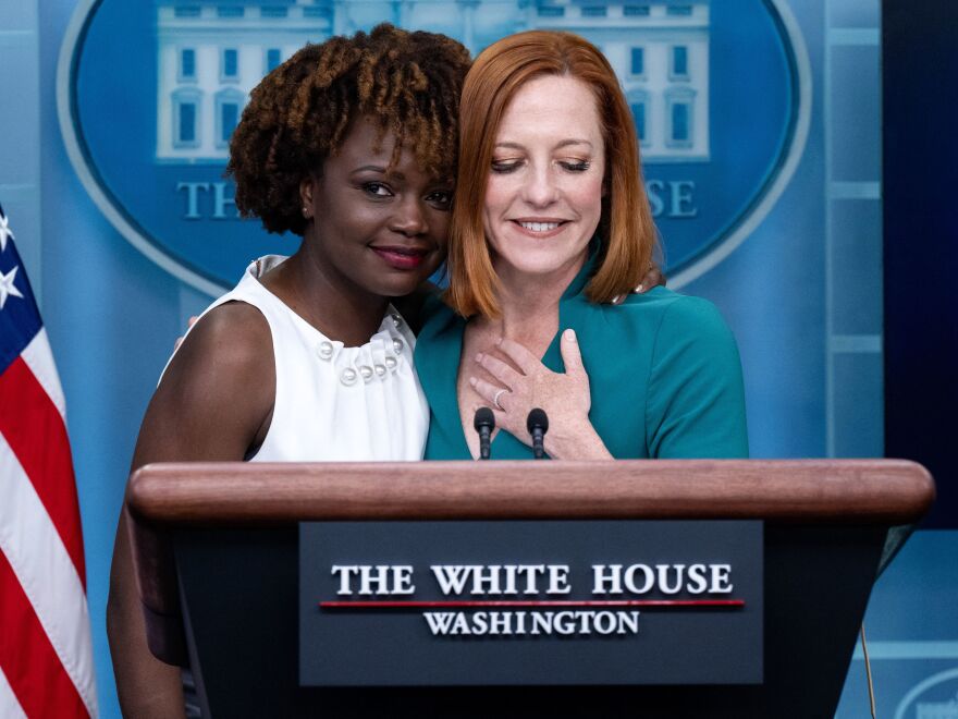 White House Press Secretary Jen Psaki is hugged by current Principal Deputy Press Secretary Karine Jean-Pierre during a press briefing at the White House on Thursday after it was announced Psaki would step down from her role next week and be replaced by Jean-Pierre.