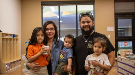 The Lopez family takes a photo together in one of the Pre-K 4 SA classrooms on Tuesday, Oct. 20, 2026. Since connecting with Pre-K 4 SA, dad Alex Lopez has returned to school to pursue his dream of becoming an early childhood educator.