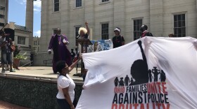 Marcy Bailey speaks to the crowd at Courthouse Square about her son Kareem Ali Nadir Jones, who was shot and killed by Columbus police officers in 2017.