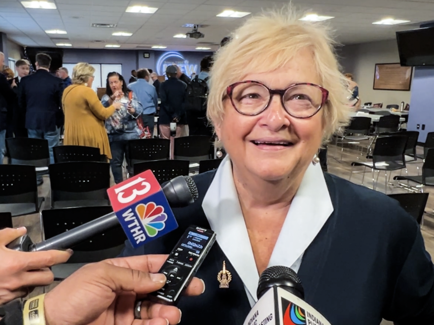Former State Sen. Karen Tallian smiles as she speaks to reporters following her election as Indiana Democratic Party chair on March 15, 2025.