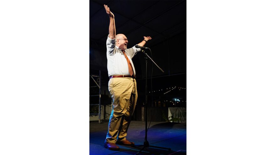 Gainesville Mayor Harvey Ward raises his hands to celebrate his win at Heartwood Soundstage in Gainesville, Fla., on Tuesday, Nov. 8, 2022. Ward’s father said Ward has always been interested in politics, history and making a difference. (Lexi Ashby/WUFT News)