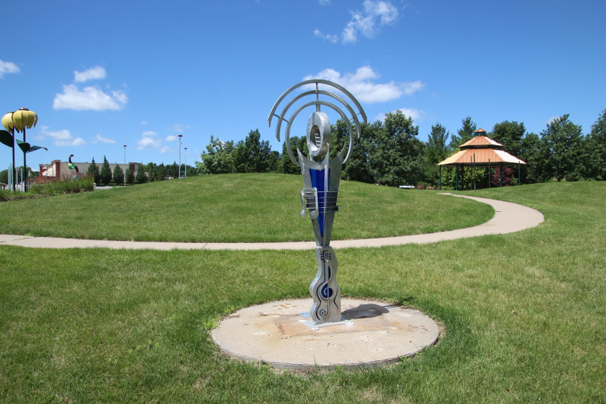 A public sculpture at Faye's Field, next to the Bettendorf Public Library.