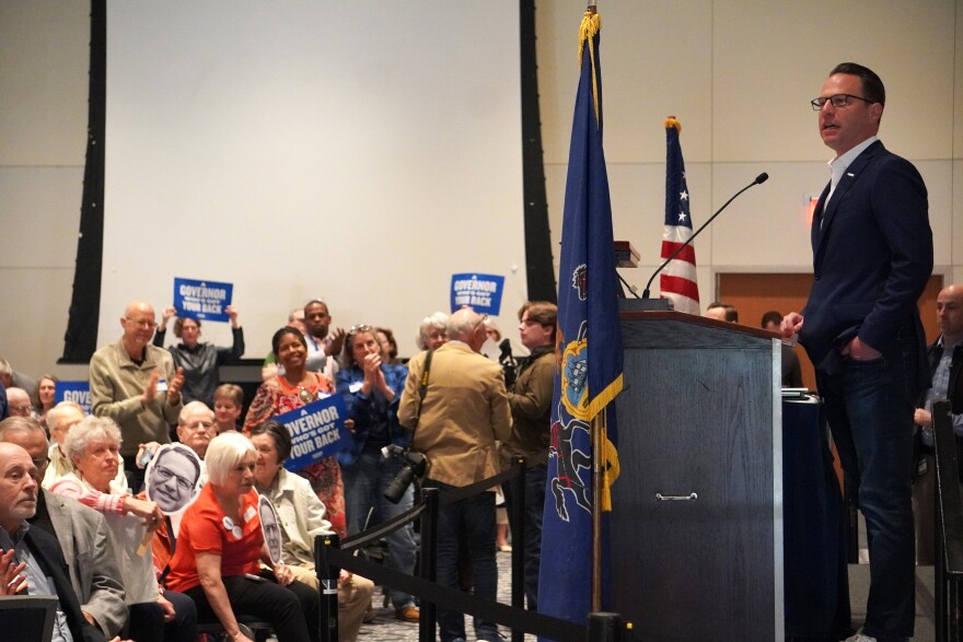 Gov. Josh Shapiro (right, at podium) spoke to nearly 400 people at the Penn Stater in State College Saturday morning. Shapiro and other Democrats are rallying voters ahead of this year's midterm elections. 