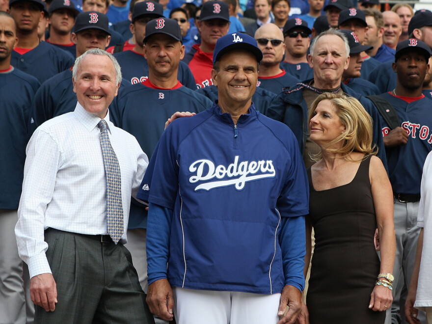 During happier times, Frank and  Jamie McCourt hang out with manager Joe Torre before a 2008 Dodger game.