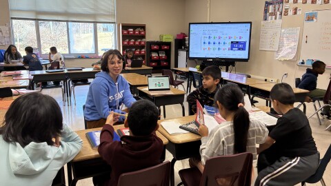Winston-Salem TEACH Resident Sofia Fuentes works with a small group on the elements of narrative writing at Diggs-Latham Elementary School.