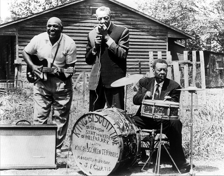 Sonny Boy Williamson with guitarist Houston Stackhouse and drummer Peck Curtis in 1965, 24 years after the premiere of King Biscuit Time on KFFA in Helena, Arkansas