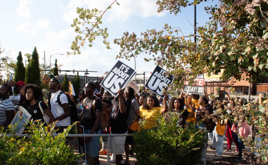 UNCG, NC A&T students walk to the polls for to cast their ballots