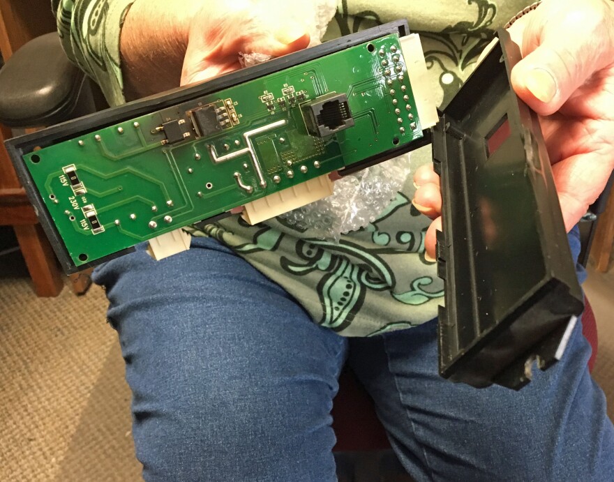 This damaged freezer circuit board has been replaced. The repair cost the center $526, which Executive Director Rita Copeland is trying to recoup through insurance.