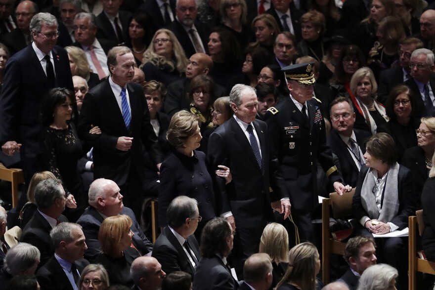 Former President George W. Bush, center, former first lady Laura Bush, Neil Bush, Sharon Bush and Jeb Bush, arrive for the State Funeral for former President George H.W. Bush, at the National Cathedral, Wednesday, Dec. 5, 2018, in Washington. 