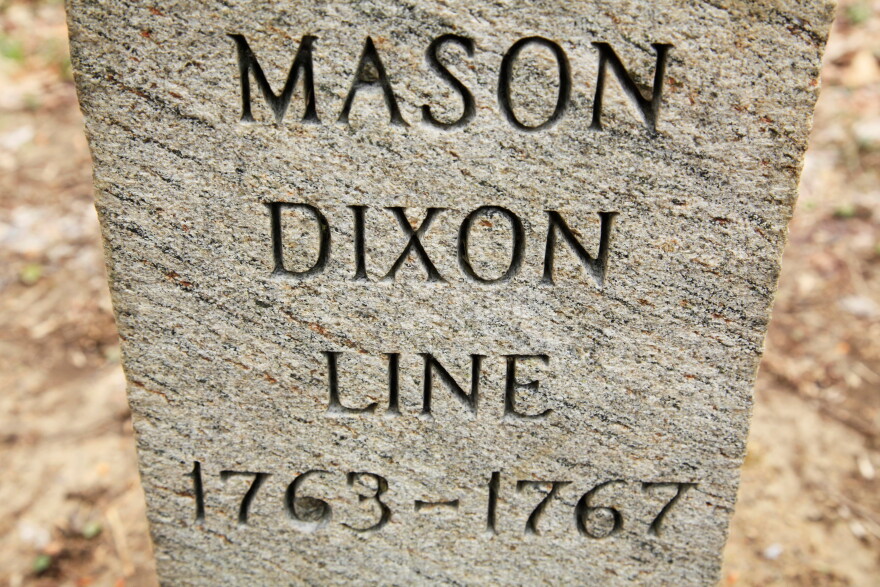 In this Friday, April 15, 2011, photo in Newark Del., shown is a post marking the base point in the survey of Charles Mason and Jeremiah Dixon. Mason and Dixon began their survey a century before the Civil War to settle a border dispute between Pennsylvania and Maryland.