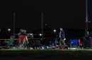 Investigators look over the scene at Stryker Sports Complex on Saturday after a truck drove onto the soccer field, killing two people.