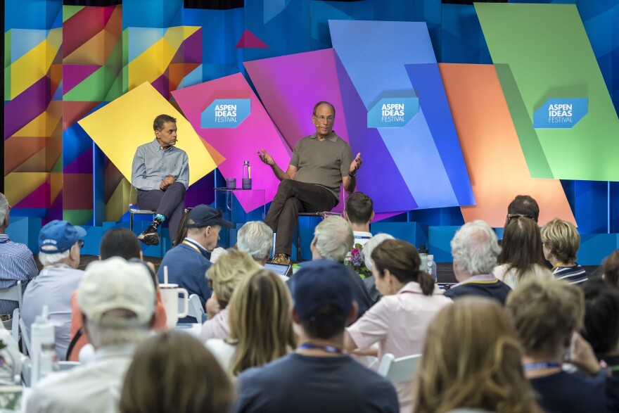 Journalist Fareed Zakaria, left, interviews BlackRock CEO Larry Fink during an Aspen Ideas Festival panel on Tuesday, July 30, 2026. During the talk, Fink expressed excitement about AI’s contribution to the U.S. economy.