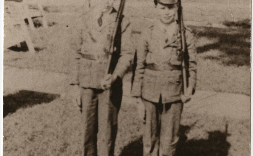 Billy (left) and his brother Dewey, playing soldiers as children at Fort Bragg during World War II.