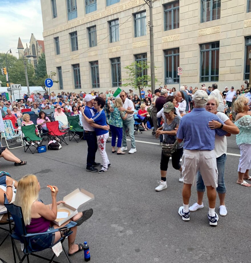 Music lovers enjoy music and dance near one of the stages at La Festa Italiana.