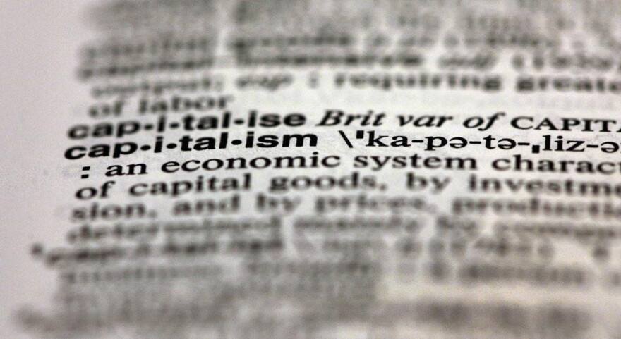 The word "capitalism" was one of Merriam-Webster's most looked-up words of 2012. (Richard Drew/AP)